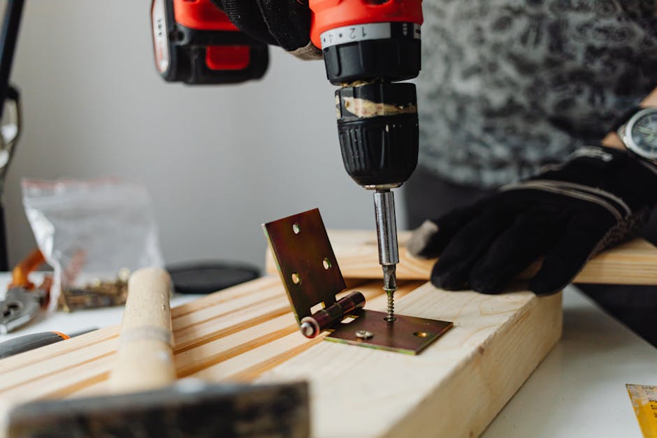 Professional carpenter installing wood cabinets for a wardrobe